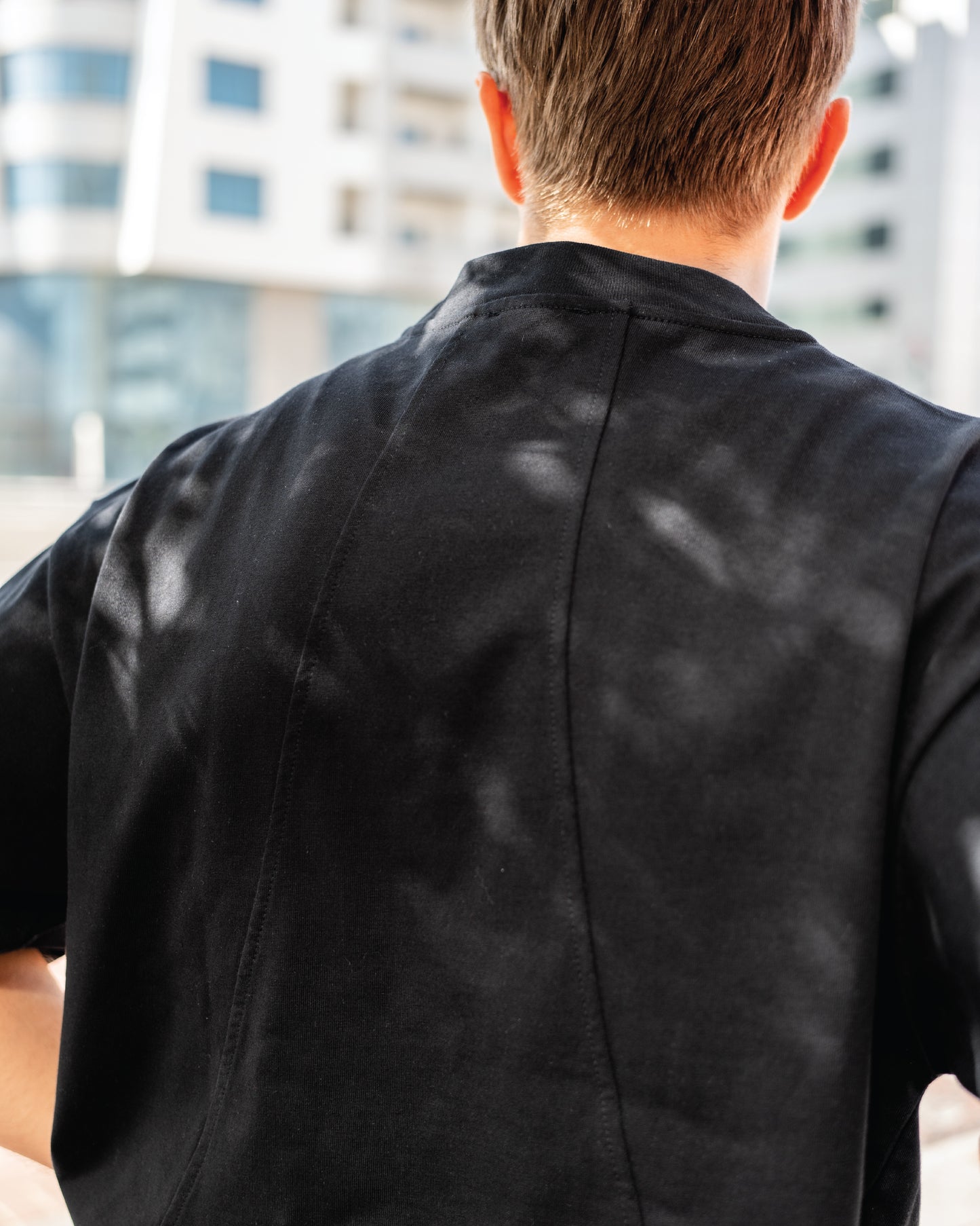 Boxy oversized t-shirt with koi fish print by Shin Seikatsu — Japanese-inspired fashion in Dubai