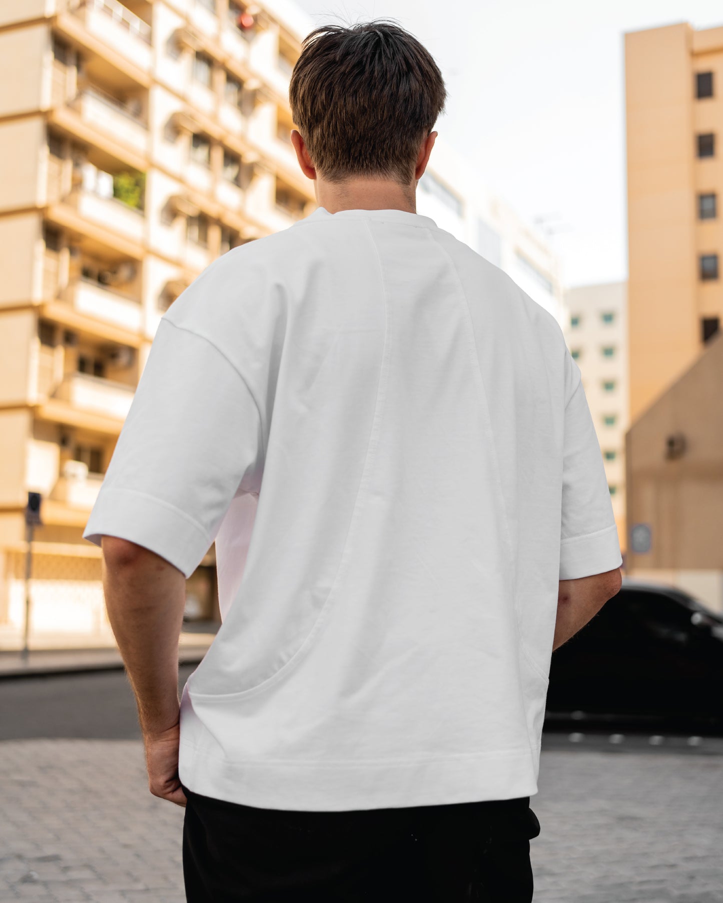 Boxy oversized t-shirt with koi fish print by Shin Seikatsu — Japanese-inspired fashion in Dubai