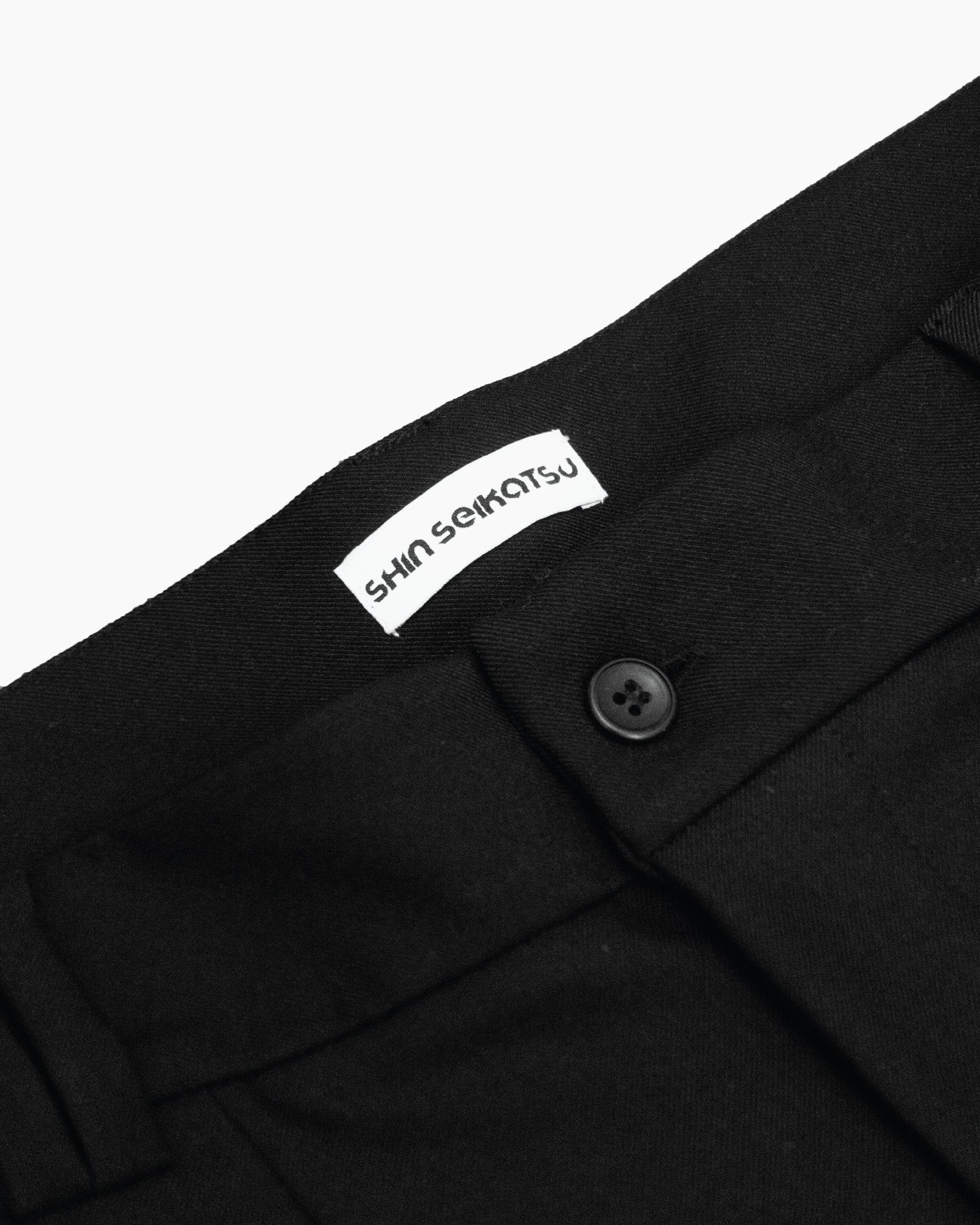 Baggy tobi trousers with double pleats — contemporary Japanese-inspired pants from Shin Seikatsu made in Dubai